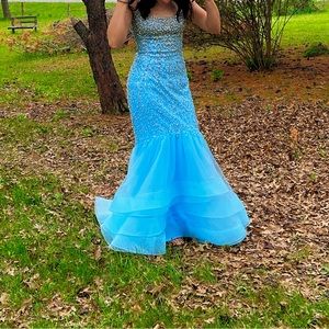 Mermaid style sequin prom dress with train